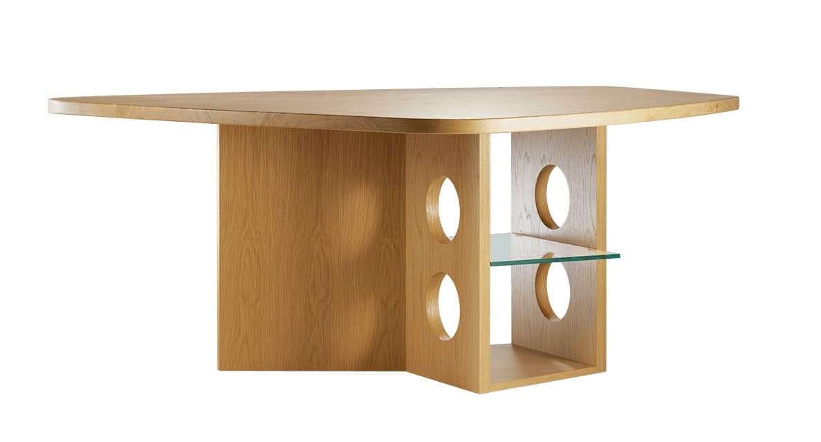A contemporary coffee table constructed from light-toned wood, possibly oak, featuring an irregularly shaped top with rounded corners. The base is composed of solid wood panels, one forming a broad side support, and another central structure that includes a compartment with multiple circular cutouts and an integrated clear glass shelf. The overall aesthetic is modern and minimalist with unique design details. — 3D model