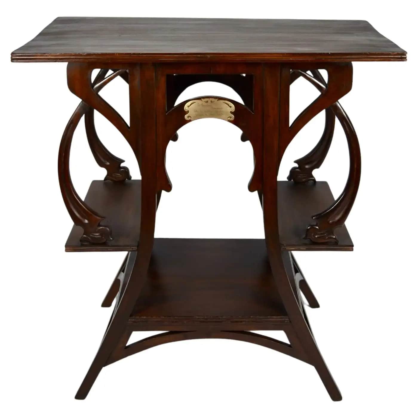 A dark wooden accent table with a rectangular top and two lower shelves. The table features ornate,… — 3D model