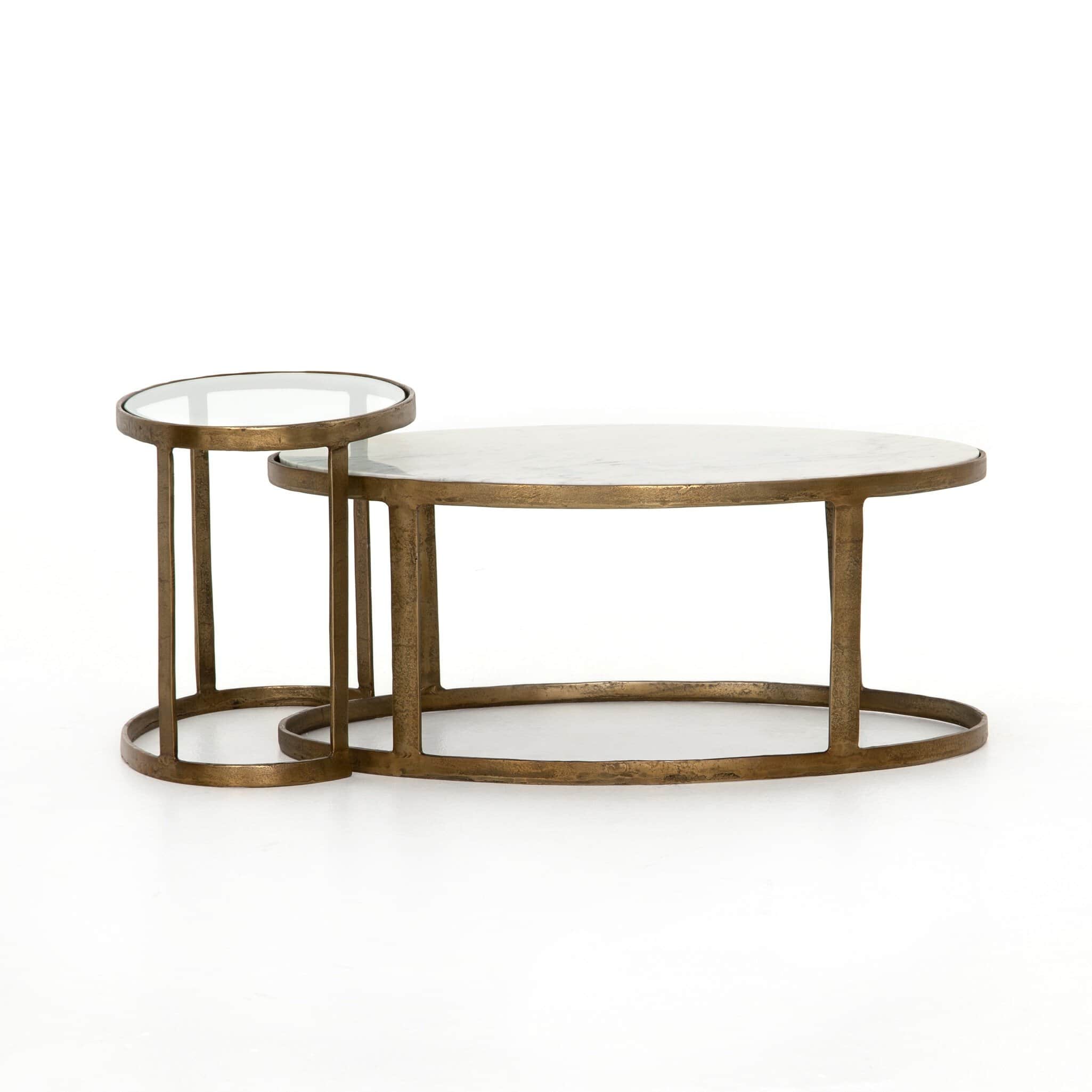 A nesting set of two coffee tables with oval tops. The larger table has an oval top and a base const… — 3D model