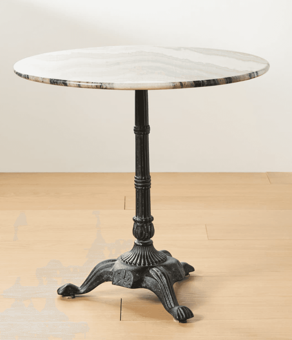 A round table featuring a polished white marble top with natural grey veining, supported by a dark,… — 3D model