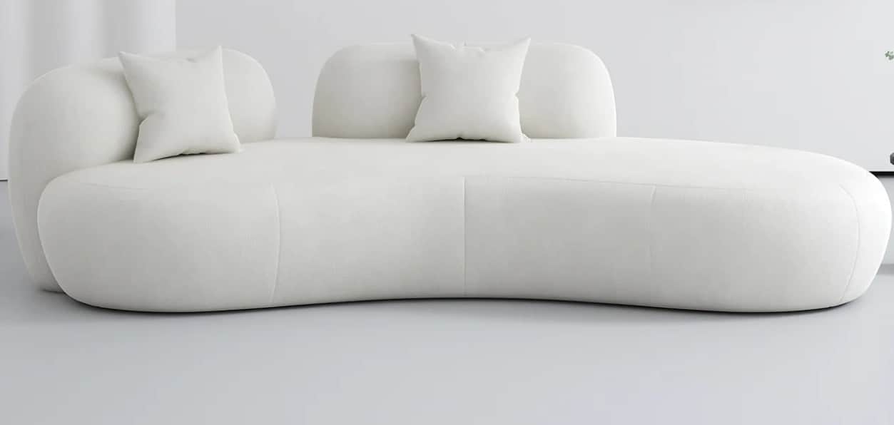 A contemporary sofa featuring a curvilinear, organic form, upholstered in a textured white fabric, a… — free GLB 3D model