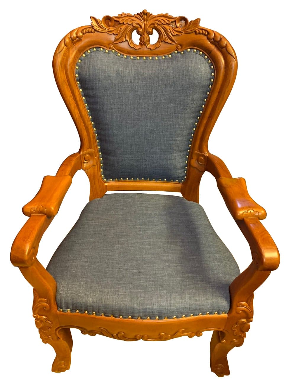 A highly ornate, traditional style armchair featuring a richly carved wooden frame with upholstered seat and back in a plain grey fabric, detailed with brass nailhead trim. — 3D model