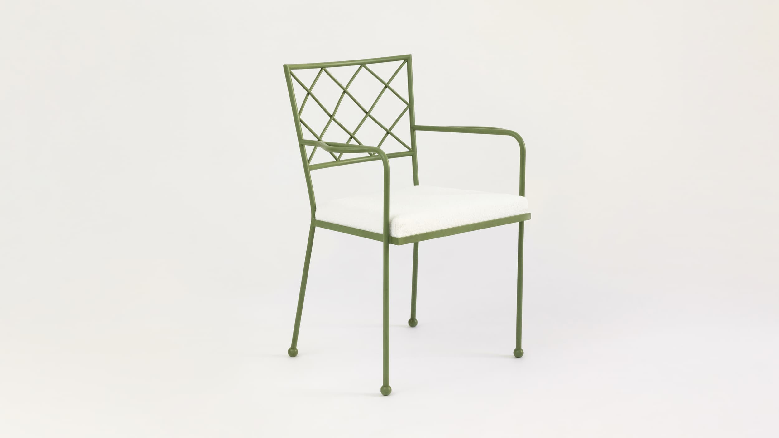 A green metal armchair with a white upholstered seat and a diamond-patterned backrest. The armchair has four slender legs that terminate in small, rounded feet. The armrests are curved and connect the backrest to the seat frame. — 3D model
