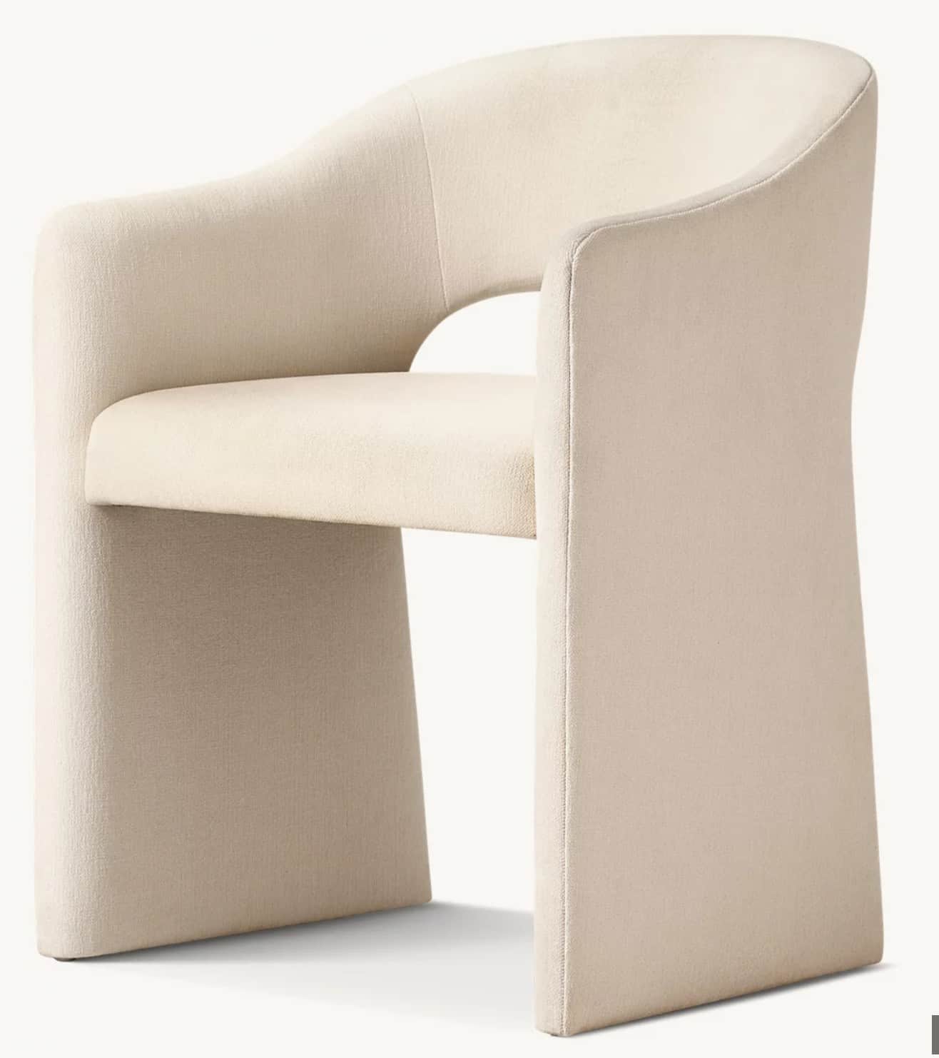 A contemporary upholstered armchair featuring a curved barrel-style back and integrated armrests tha… — 3D model