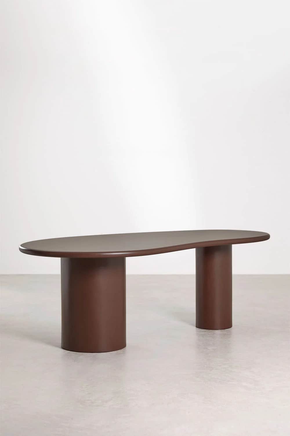 An irregularly shaped coffee table with a unique, organic form. It features a flat, wide tabletop wi… — 3D model