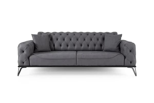 A contemporary charcoal grey two-seater sofa featuring deep button tufting on the backrest and arms, supported by a minimalist black metal frame and sled legs. — 3D model