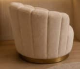 An upholstered accent chair with a distinctive fluted or channel-tufted backrest and rounded arms, finished in a cream-colored fabric and supported by a golden metal plinth base. — 3D model