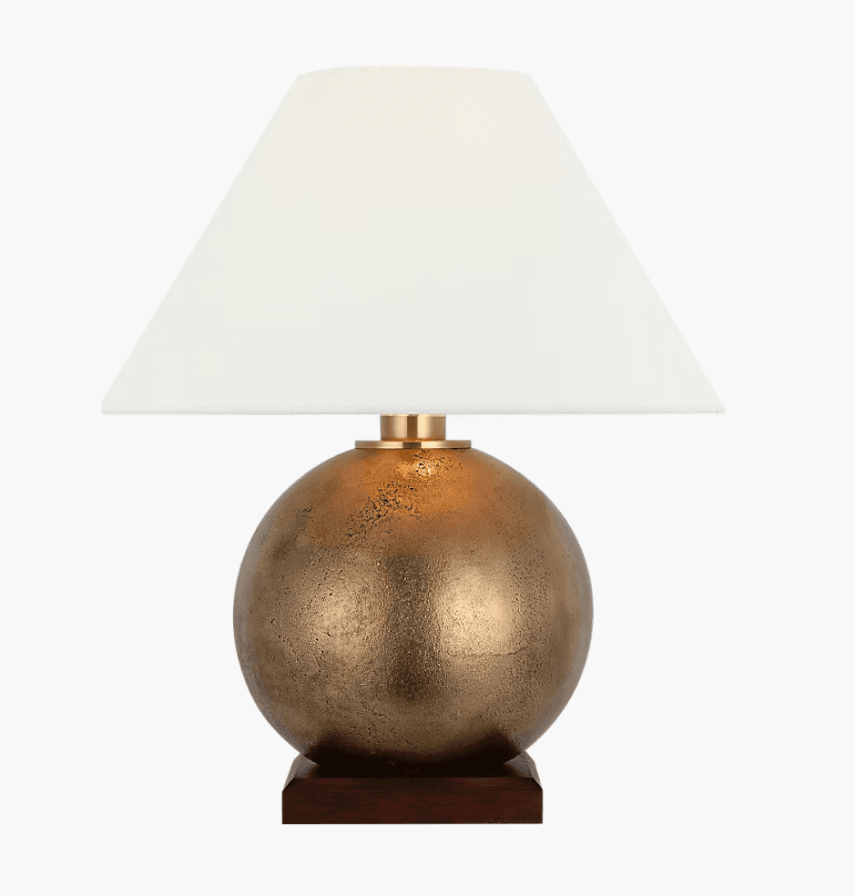A table lamp featuring a spherical, textured bronze-finished body, supported by a square dark wood b… — 3D model