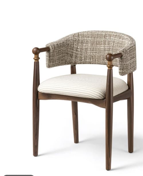 A sophisticated Mid-Century style armchair featuring a dark walnut wooden frame and two distinct upholstered sections. The curved barrel backrest and integrated armrests are covered in a textured, brown and off-white tweed-like fabric, while the seat cushion is upholstered in a lighter, cream-colored fabric with subtle thin stripes. The chair is supported by four tapered wooden legs, and the armrests are adorned with decorative spherical wooden finials where they meet the front legs. — 3D model