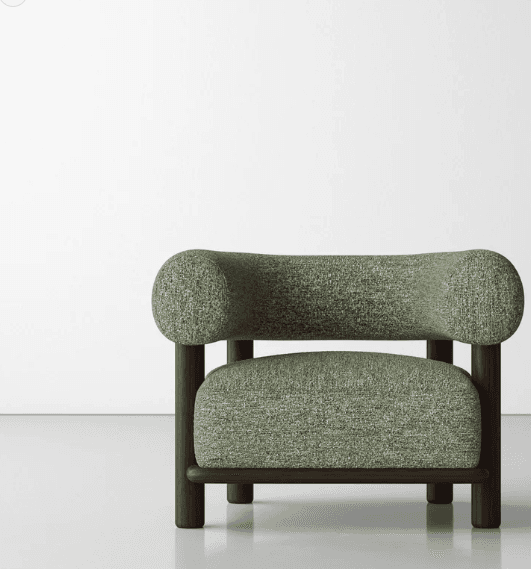 A contemporary low-slung lounge chair featuring a distinctive design with chunky, rounded upholstered elements forming the backrest and armrests, set upon a robust dark wood frame with cylindrical legs. The upholstery is a textured, flecked green fabric. — 3D model