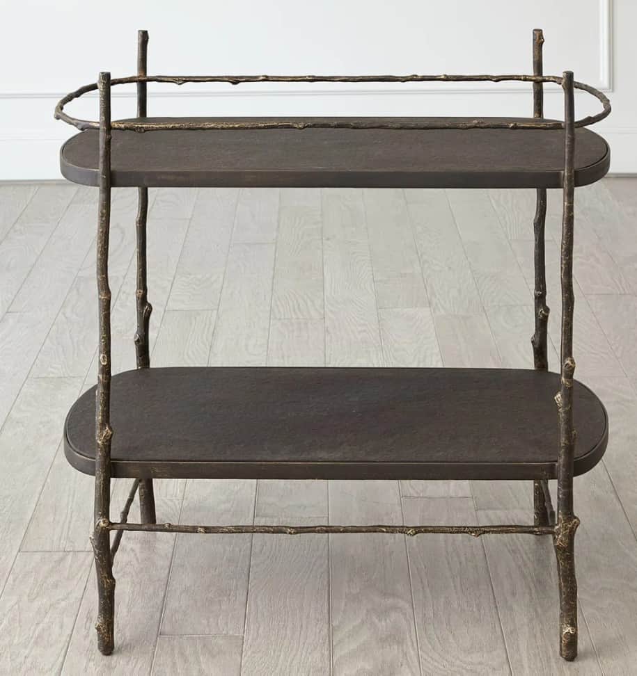 A two-tiered end table with an organic, branch-like metal frame. The frame supports two oval-shaped… — 3D model