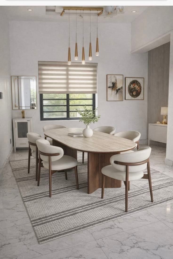 A modern dining set featuring an oval wooden pedestal table accompanied by six contemporary dining chairs with wooden frames and light-colored upholstered seats and backs. A small decorative vase with greenery is placed on the table. — 3D model