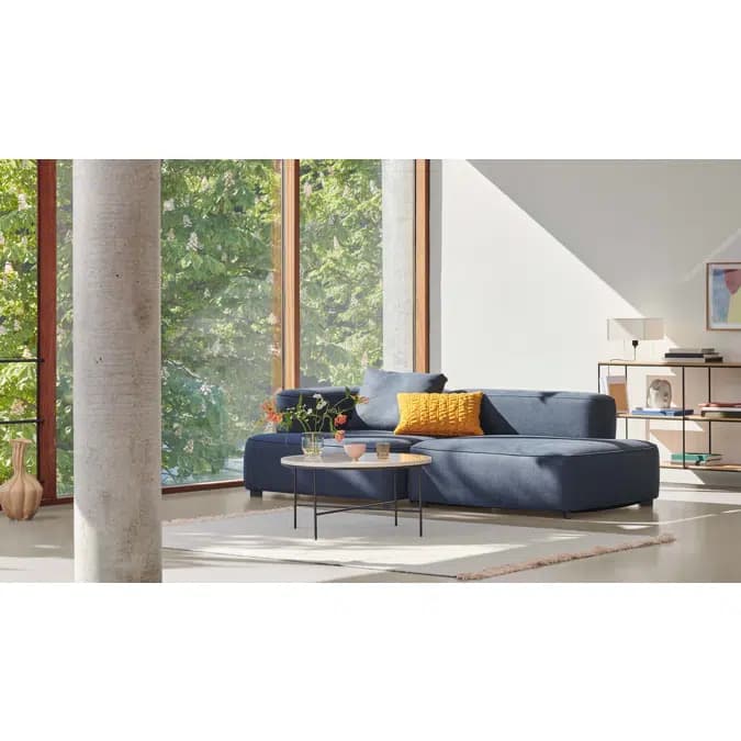 A contemporary L-shaped sectional sofa with a right-hand facing chaise lounge, upholstered in a blue woven fabric, featuring block arms and including two accent pillows. — 3D model