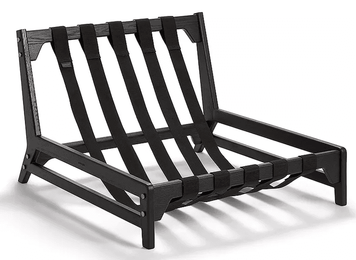 A modern, low-slung lounge chair frame constructed from black-stained wood with exposed black textile webbing for the seat and back support. The design features clean lines and visible brass pin fasteners. — 3D model