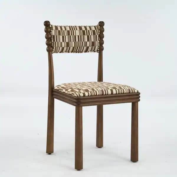 A wooden dining chair featuring turned wood spindle elements on the backrest and upholstered seat an… — 3D model