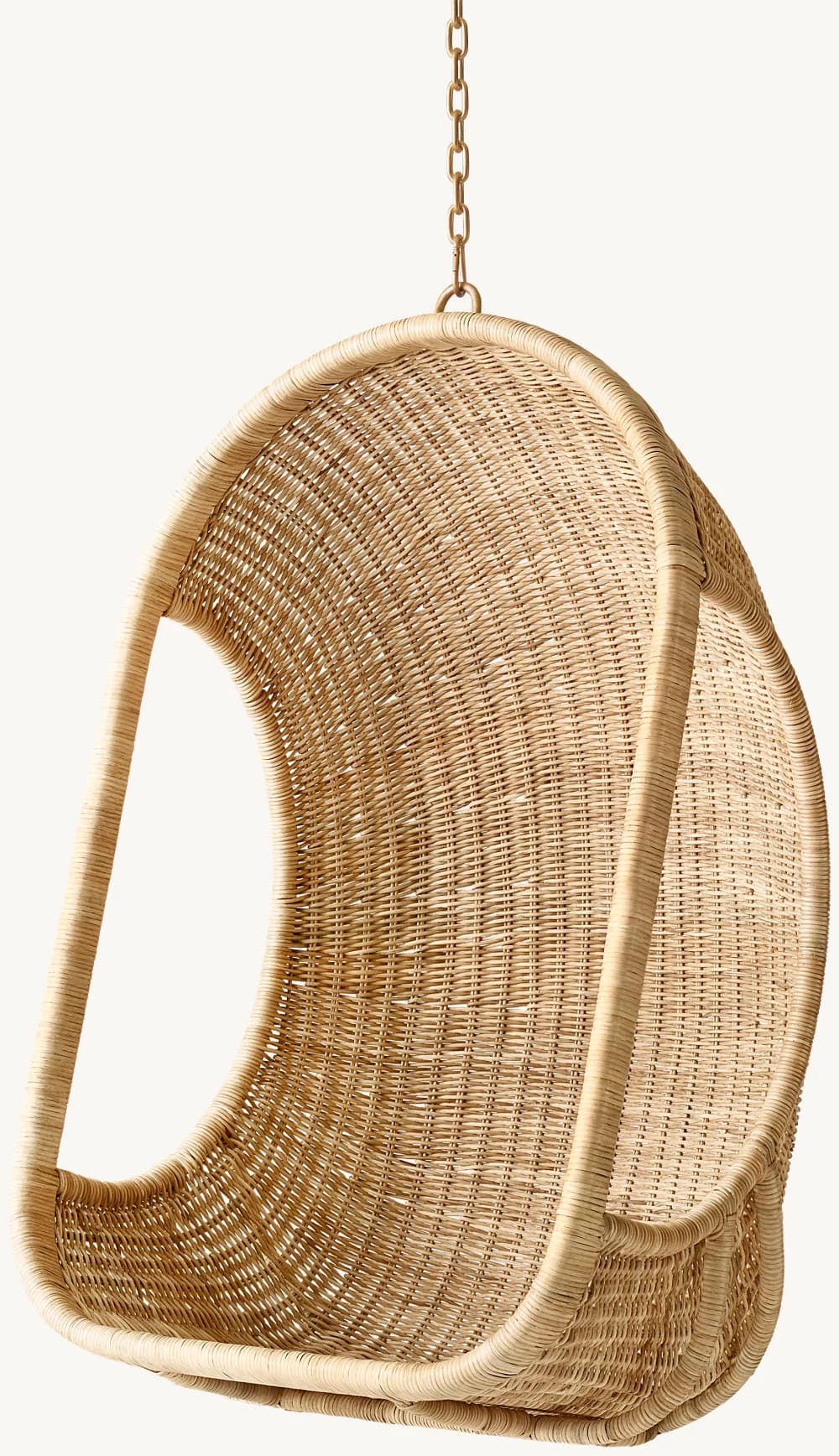 A natural wicker hanging egg chair featuring a classic rounded, cocoon-like shape suspended by a metal chain. The chair is entirely woven from natural wicker or rattan fibers, forming a sturdy yet visually lightweight shell for seating. Its organic texture and form are suitable for various interior and exterior relaxation spaces. — 3D model