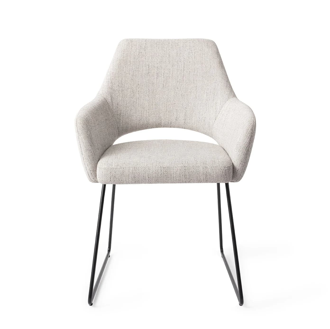 A contemporary armchair featuring a fully upholstered bucket-style seat and backrest in a light gray woven fabric. The chair is supported by a minimalist base of slender, black powder-coated metal legs, arranged in a distinctive inverted 'U' shape. — 3D model