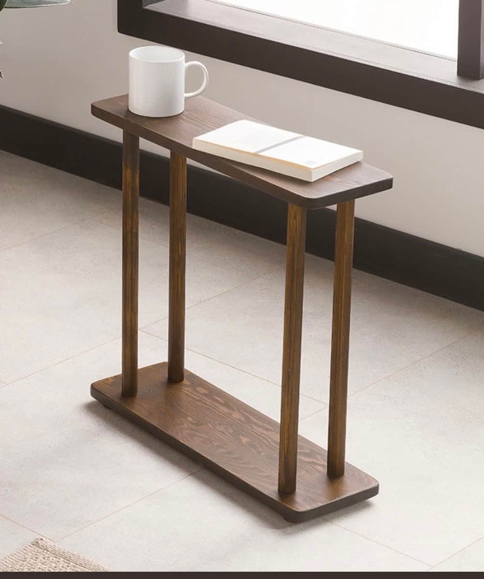A minimalist console table crafted from dark-stained wood, featuring a narrow rectangular top, a mat… — free BLEND 3D model