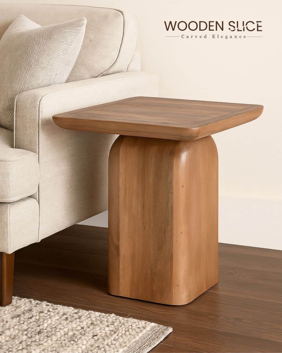 A modern solid wood table featuring a square top with gently rounded corners and a substantial, colu… — 3D model