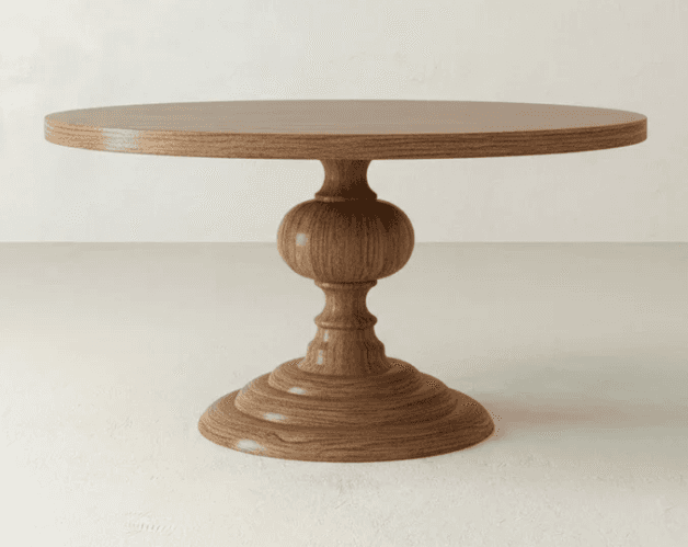 A round pedestal table with a substantial, carved wooden base. The tabletop is circular and flat. Th… — 3D model
