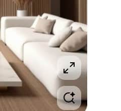 A modern, modular white sofa with deep, plush cushions. The sofa appears to be constructed from fabr… — 3D model