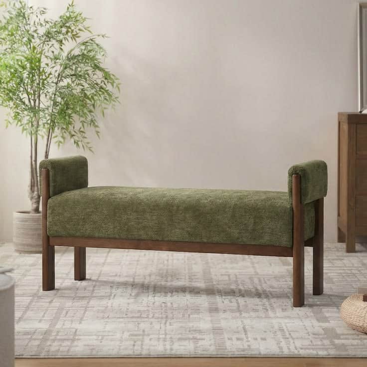 An upholstered bench featuring a dark wooden frame and a rectangular seat with integrated padded arm… — 3D model