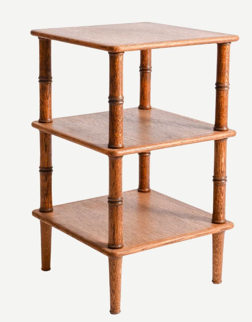 A square, three-tiered wooden side table featuring turned column legs with decorative bamboo-like de… — 3D model