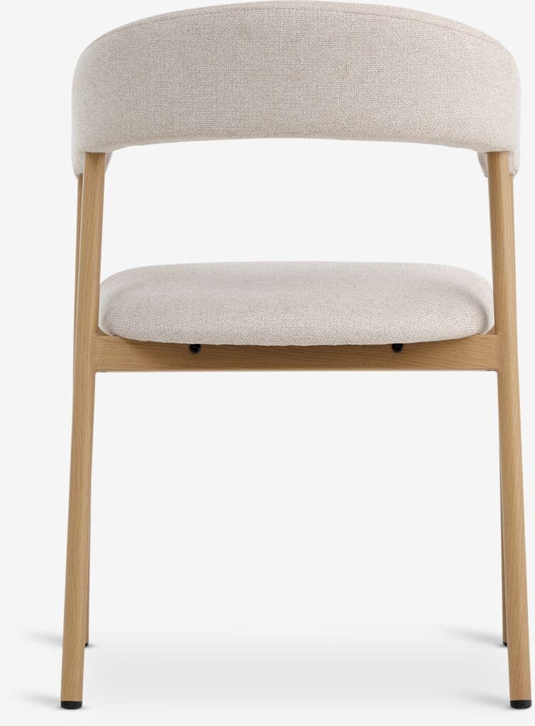 A chair with a curved upholstered backrest and a separate upholstered seat. The frame and legs are made of light-colored wood. The upholstery has a visible texture. — 3D model