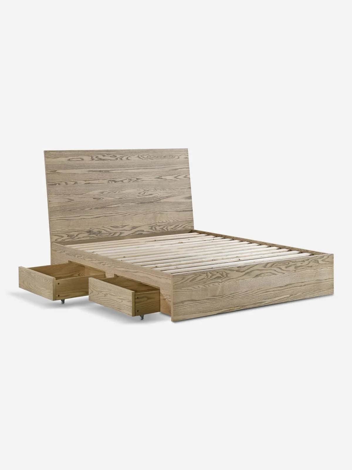 A wooden bed frame with an integrated headboard and two pull-out drawers at the foot of the bed. The… — free BLEND 3D model