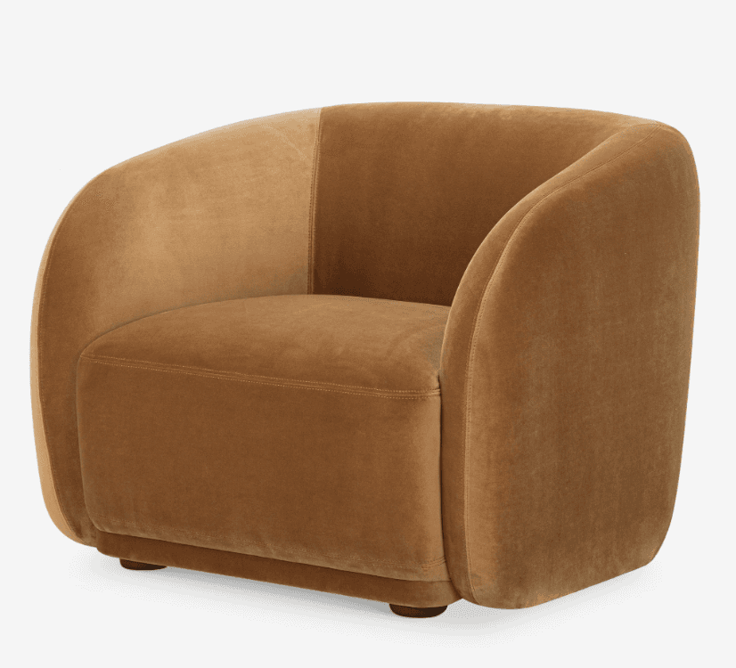 A fully upholstered barrel-shaped accent chair in a warm camel-colored velvet fabric. The chair feat… — 3D model