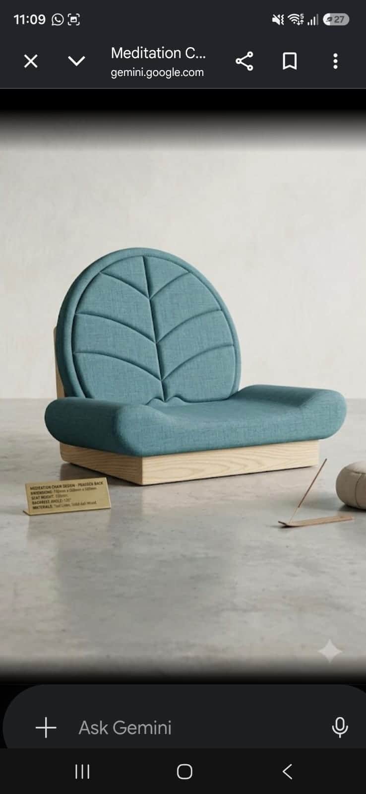 A modern low-profile floor chair featuring a distinctive leaf-shaped backrest. The seat and backrest… — 3D model