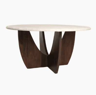 A round coffee table with a textured, off-white marble or stone top supported by a dark wood base. The base features a sculptural, intersecting design with curved elements that create an open, organic form. — 3D model