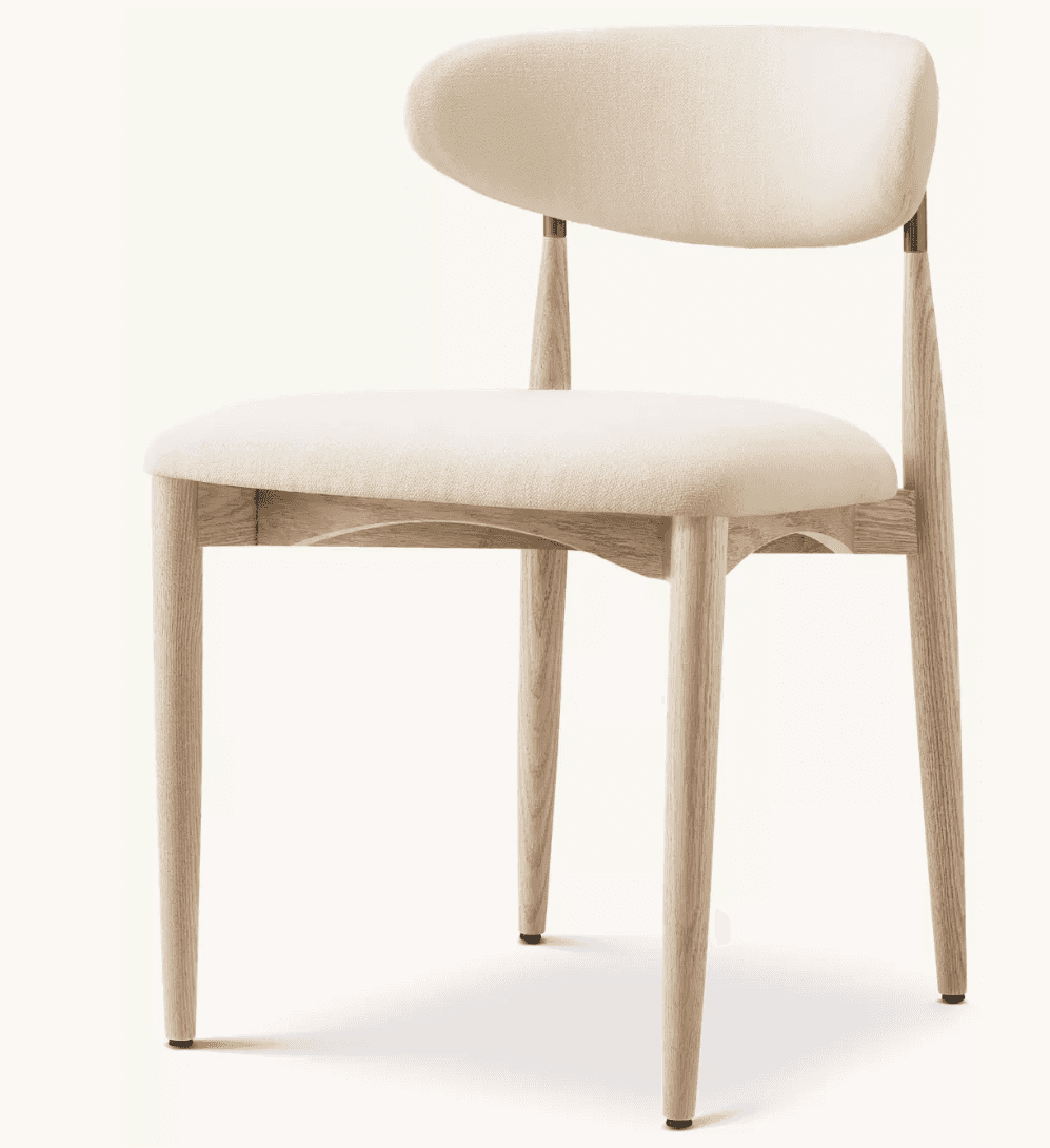 A modern dining chair with a cushioned seat and backrest, supported by a light-colored wooden frame.… — 3D model