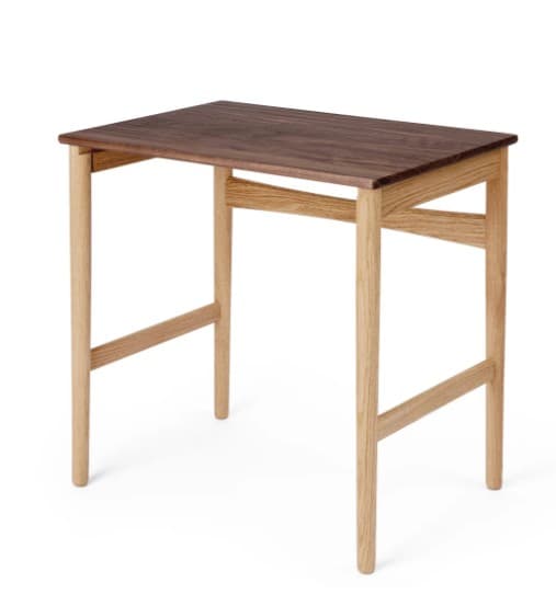 A compact rectangular table with a dark wood top and a lighter natural wood frame and legs, designed in a minimalist style. — 3D model