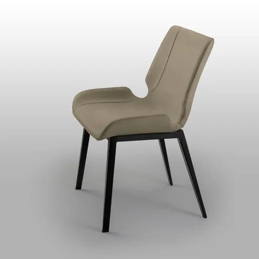 A contemporary dining chair featuring a fully upholstered seat and back in a taupe or light beige color, supported by black tapered metal legs. The chair's backrest has a distinctive, gently curving profile with a subtle cutout where it meets the integrated low armrests. The upholstery appears smooth with minimal visible stitching. — 3D model