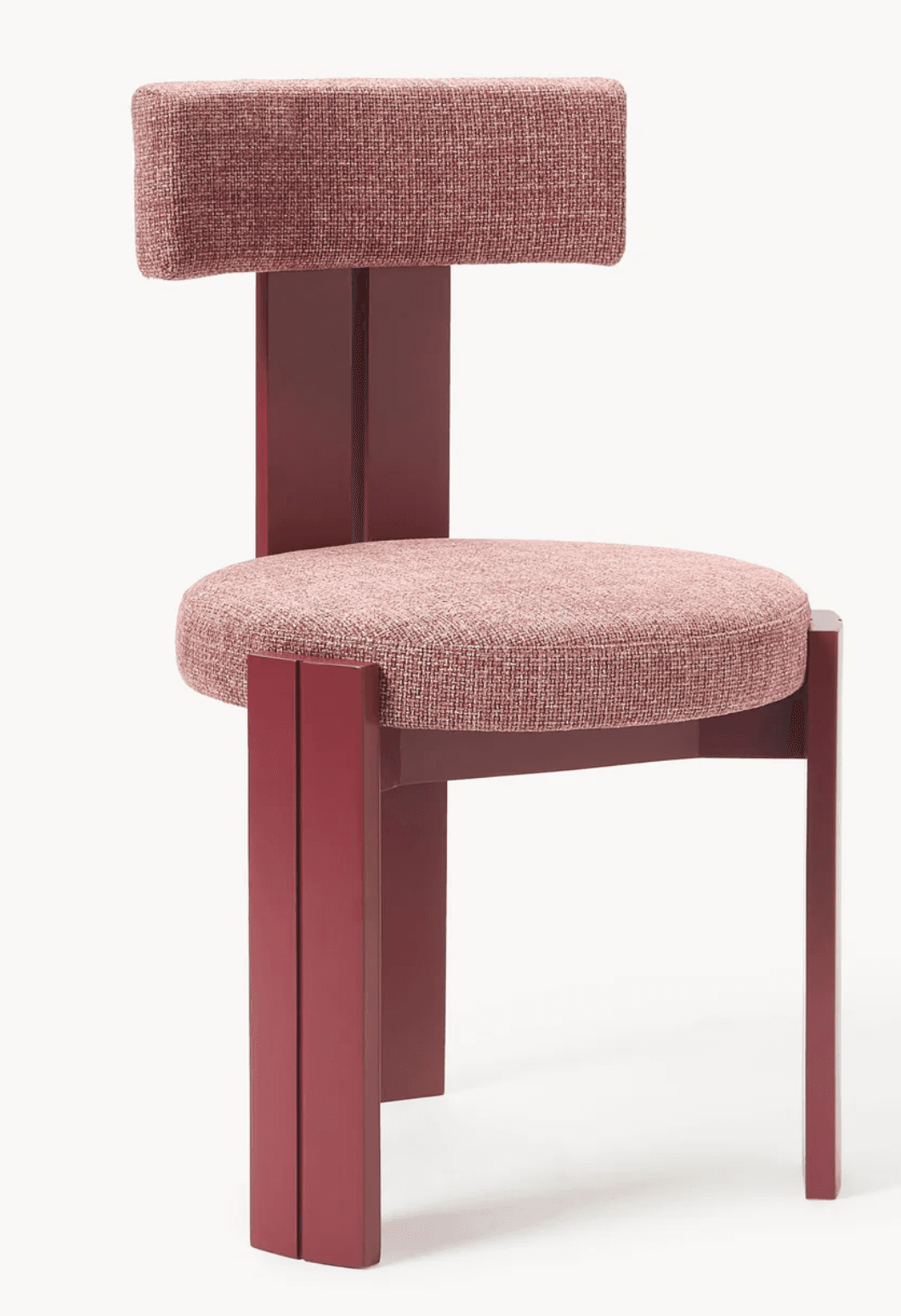 A modern dining chair with a distinct geometric design. It features a rounded, upholstered seat and a rectangular upholstered backrest supported by a central, solid frame. The legs and frame are constructed from a smooth, matte-finished material, creating a striking contrast with the textured upholstery. — 3D model