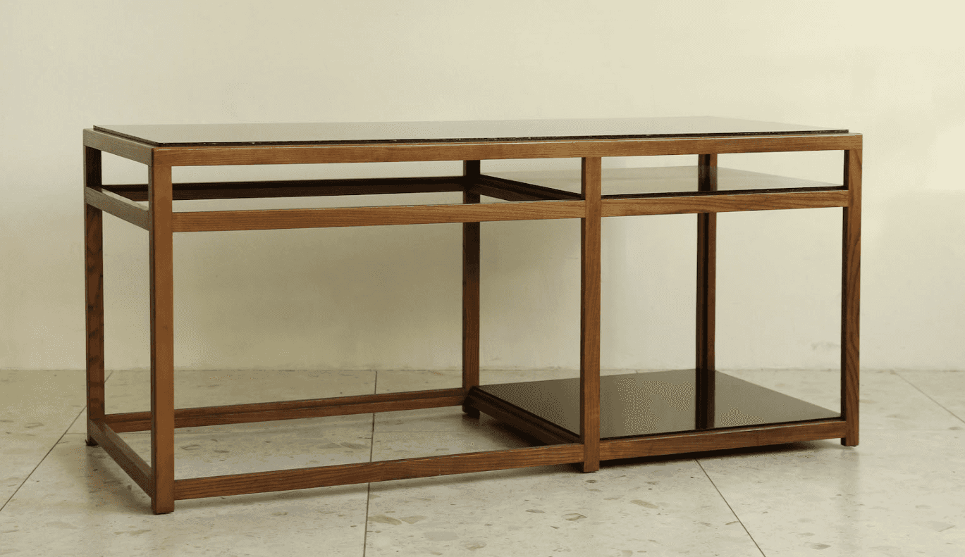 A rectangular coffee table featuring a clear, linear wood frame and two dark, possibly smoked, glass… — 3D model