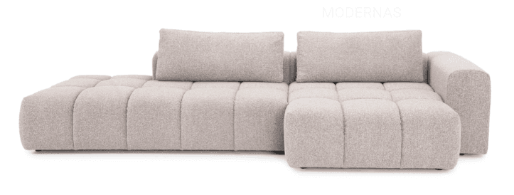 A contemporary modular sectional sofa featuring a chaise lounge on the left, upholstered in a light beige or off-white bouclé-style textured fabric. The sofa has deep channel tufting on the seat and backrest cushions, creating a distinctive segmented appearance. It includes two detached back cushions, suggesting a customizable and comfortable seating arrangement. The design is low-profile and has a soft, inviting aesthetic. — 3D model
