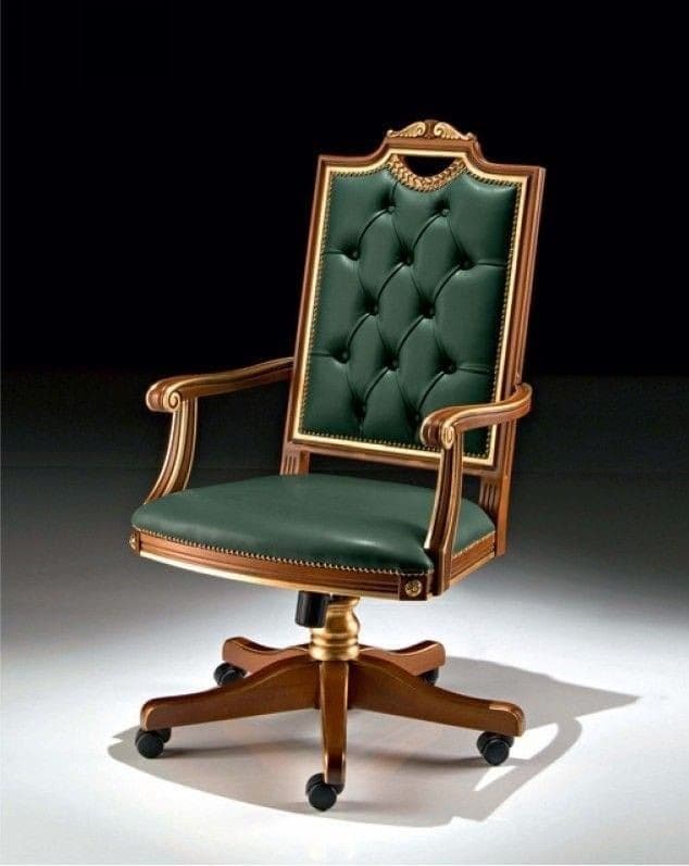 A regal and ornate desk chair featuring a high, tufted backrest and seat upholstered in deep green faux leather or leather. The robust wooden frame is adorned with intricate gilded carvings, particularly noticeable on the top rail of the backrest and along the scrolled armrests. It is supported by a five-star wooden swivel base equipped with black casters, providing mobility. Nailhead trim accents the edges of the upholstery. — 3D model