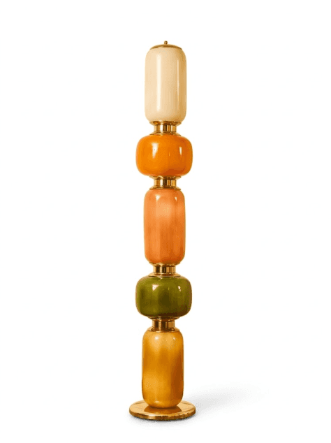 A tall, slender floor lamp featuring a stack of five distinct, translucent art glass segments connec… — 3D model