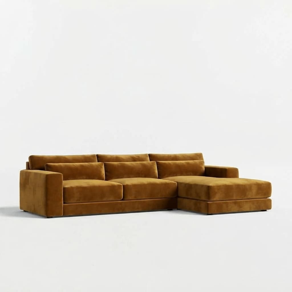 A modern, low-profile sectional sofa upholstered in a rich golden velvet fabric, featuring a chaise lounge extension on the right side, designed for contemporary living spaces. — 3D model