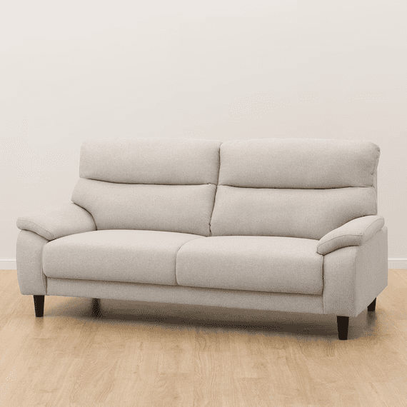 A light beige, modern two-seater sofa featuring plush, rounded cushioning and adjustable headrests f… — 3D model