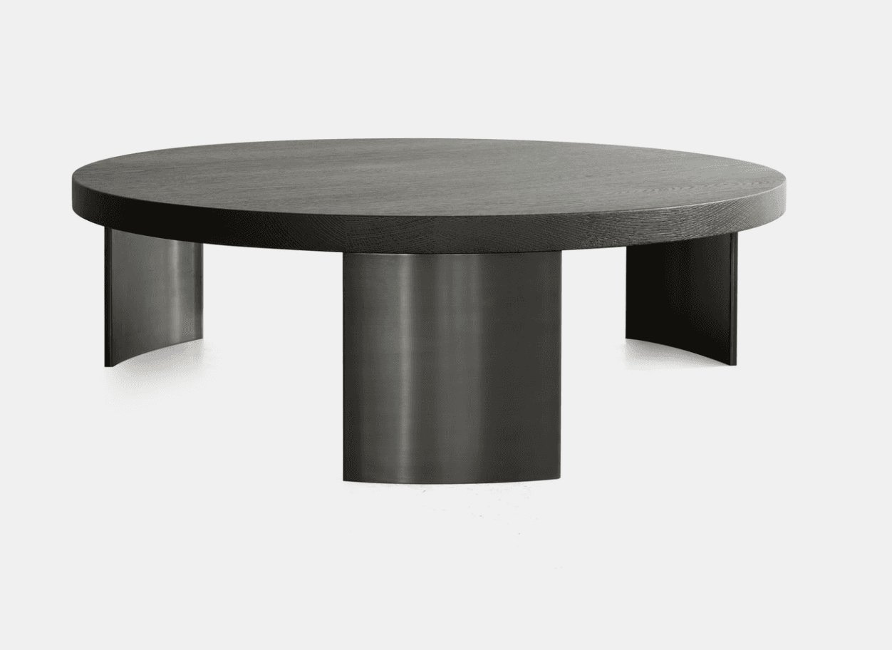 A circular coffee table featuring a dark-stained oak wood top and a multi-pillar base made of brushe… — 3D model