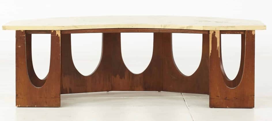 A coffee table with a light-colored, possibly marble or laminate, rectangular top with slightly beve… — 3D model