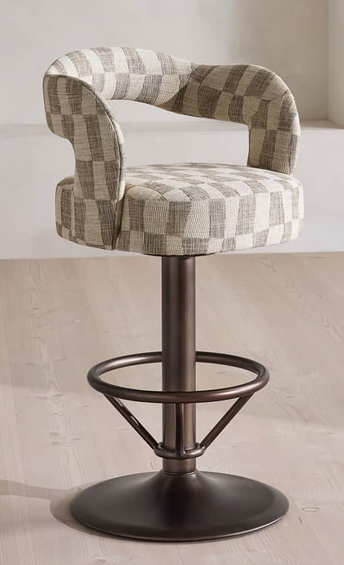 A upholstered bar stool with a rotating seat and a metal base. The seat and backrest are covered in… — 3D model