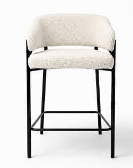 A contemporary bar stool featuring a sturdy black metal frame and cream-colored boucle fabric upholstery. The seat and low, curved backrest with integrated armrests are upholstered, and the stool includes a rectangular footrest bar. — 3D model
