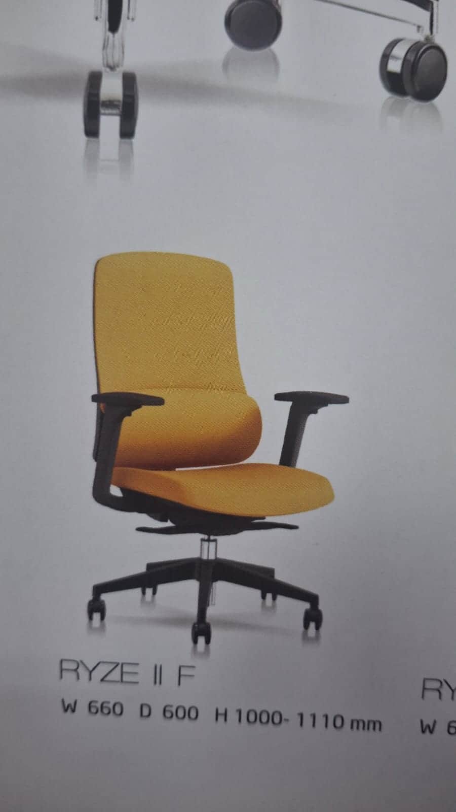 An ergonomic office chair featuring a padded seat and backrest upholstered in a textured yellow/gold… — 3D model