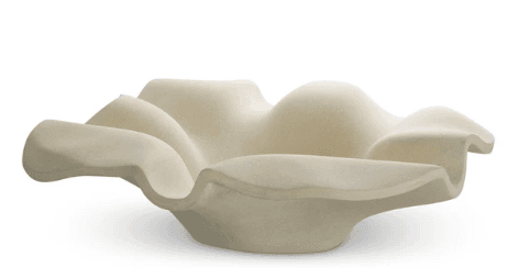 A highly sculptural and organic-shaped seating unit, fully upholstered in a light, neutral, textured fabric. Its form features deep, undulating curves reminiscent of a seashell or a natural landscape. — 3D model