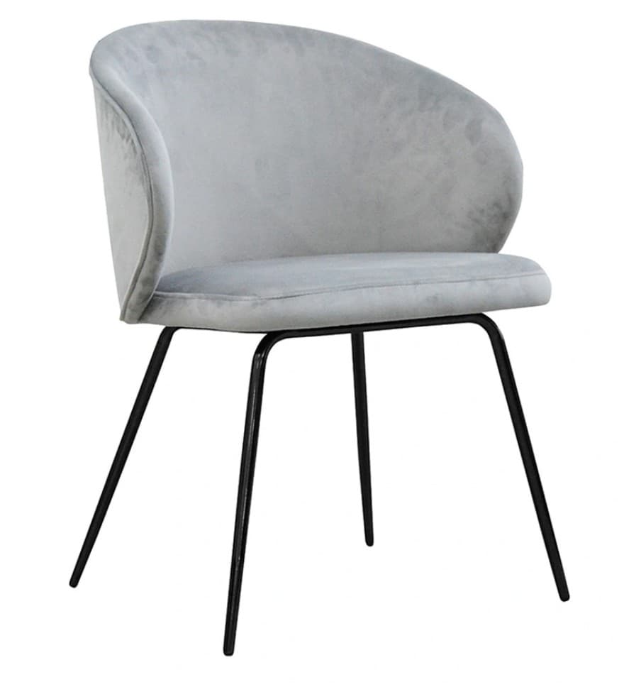 A modern armchair with a rounded, upholstered back and seat, supported by four slender, black metal legs. The upholstery appears to be a soft, textured fabric. — 3D model