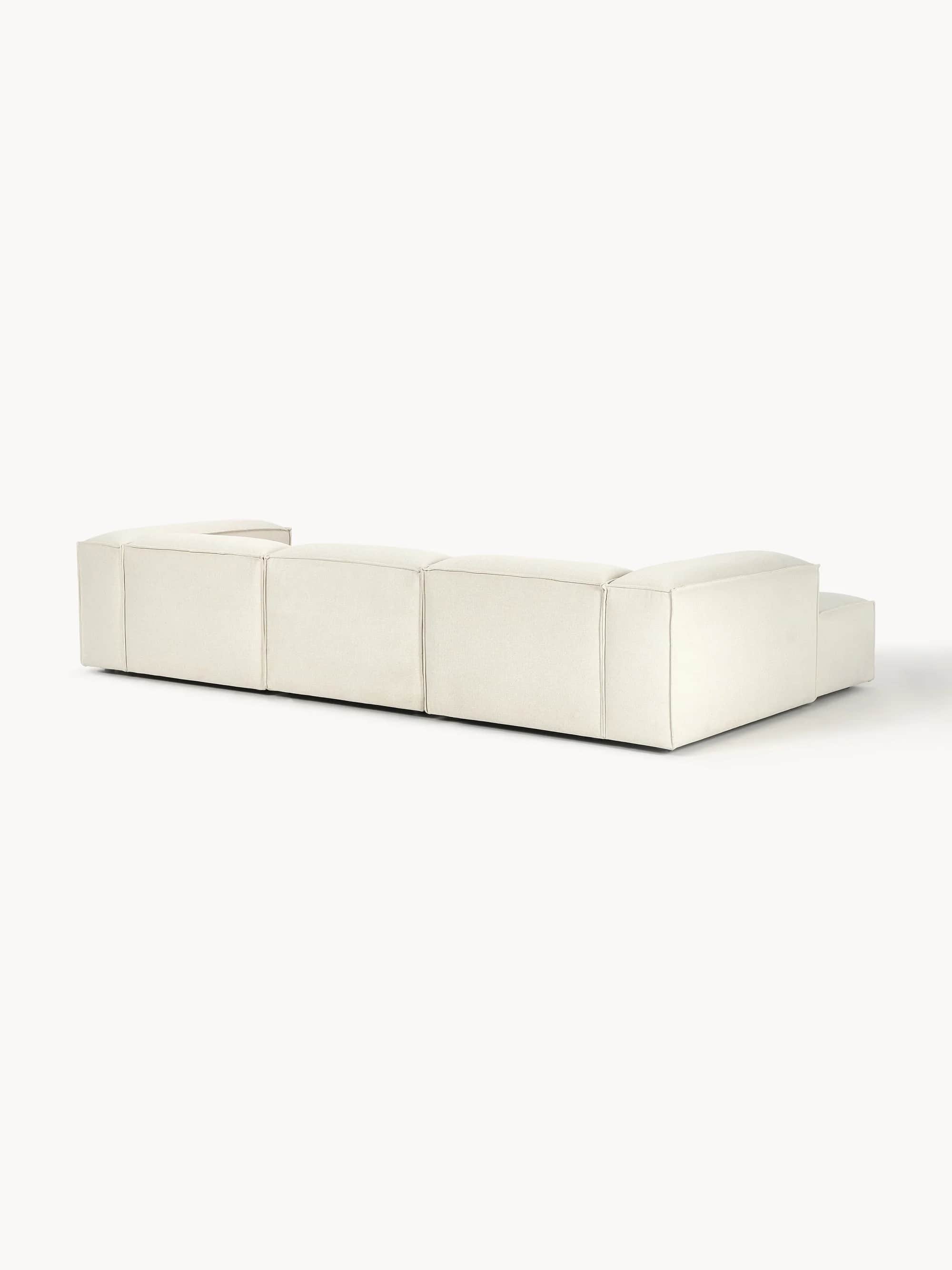 A modular sofa with clean lines and a low profile. It appears to be upholstered in a textured fabric… — 3D model